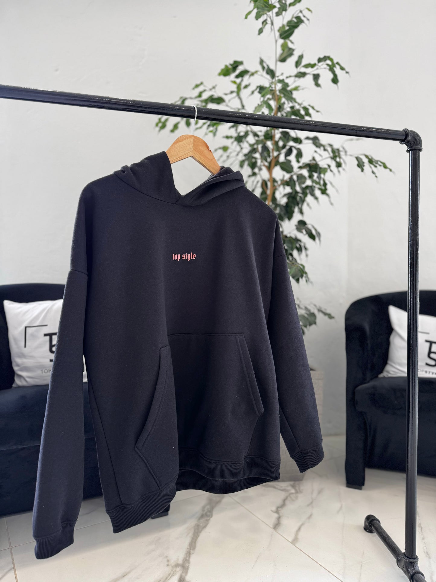 Canguro oversize negro "mariposa"