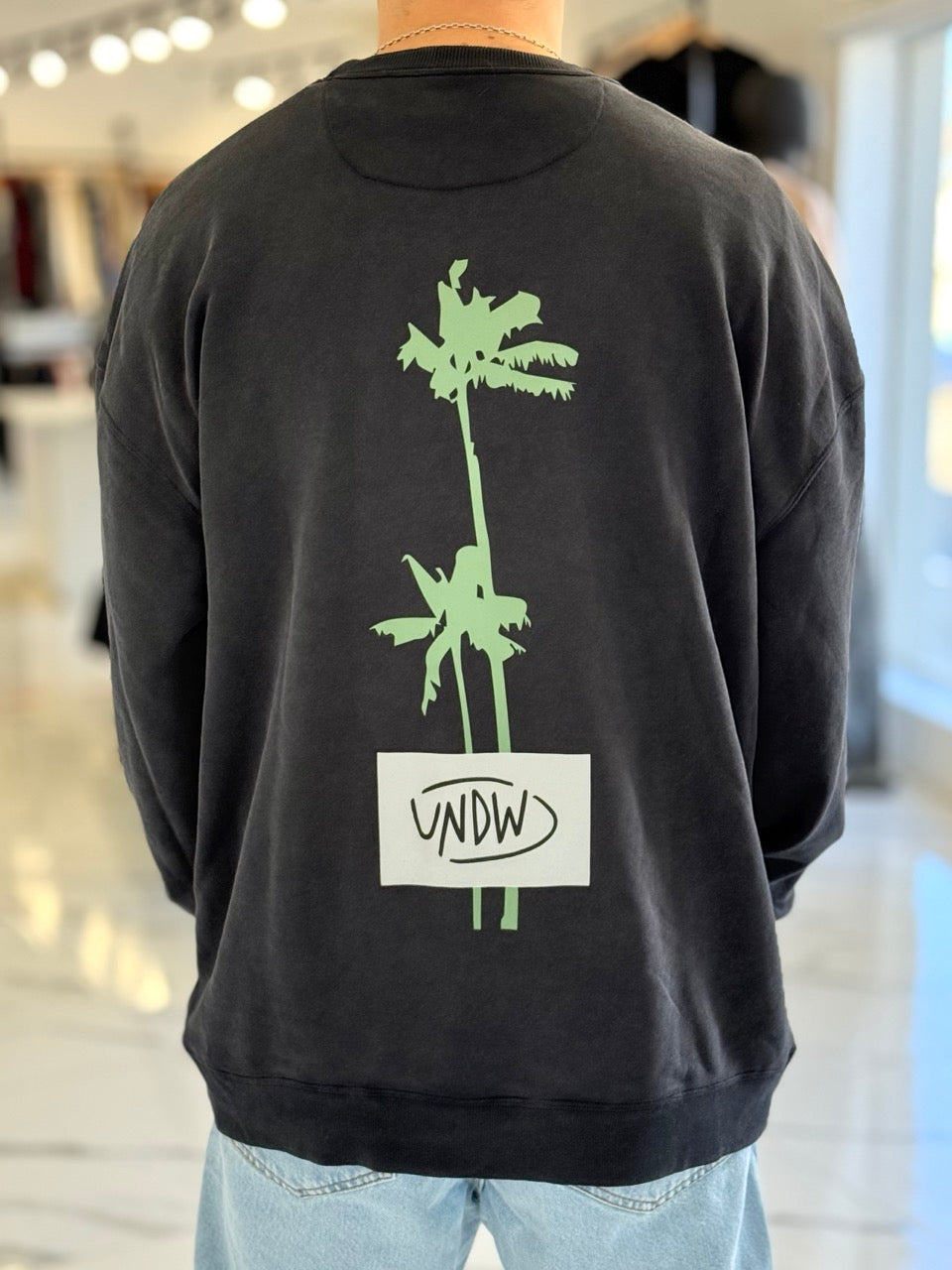 Buzo oversize "Las Grutas" negro