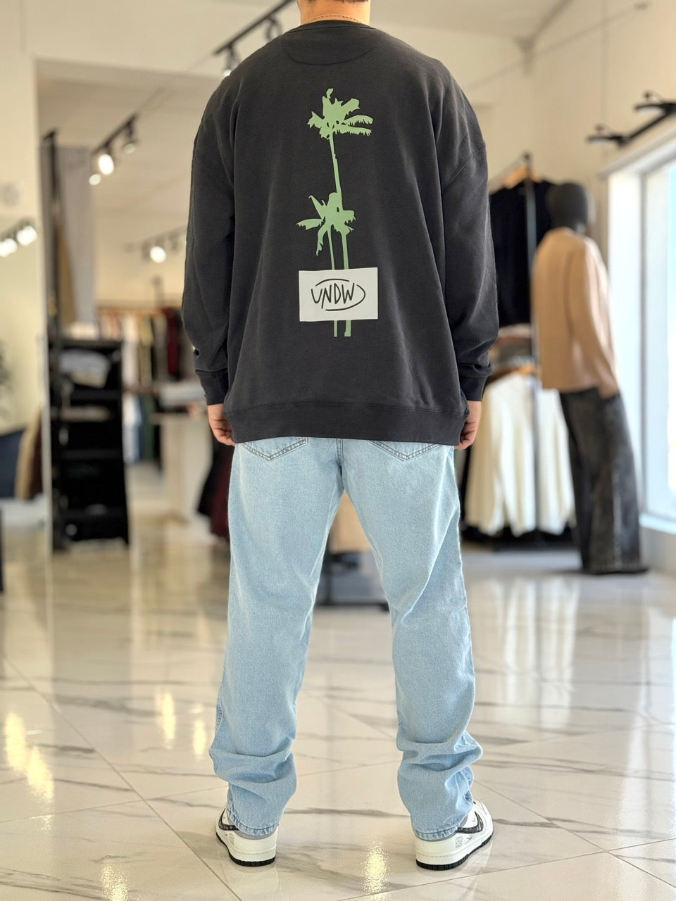 Buzo oversize "Las Grutas" negro
