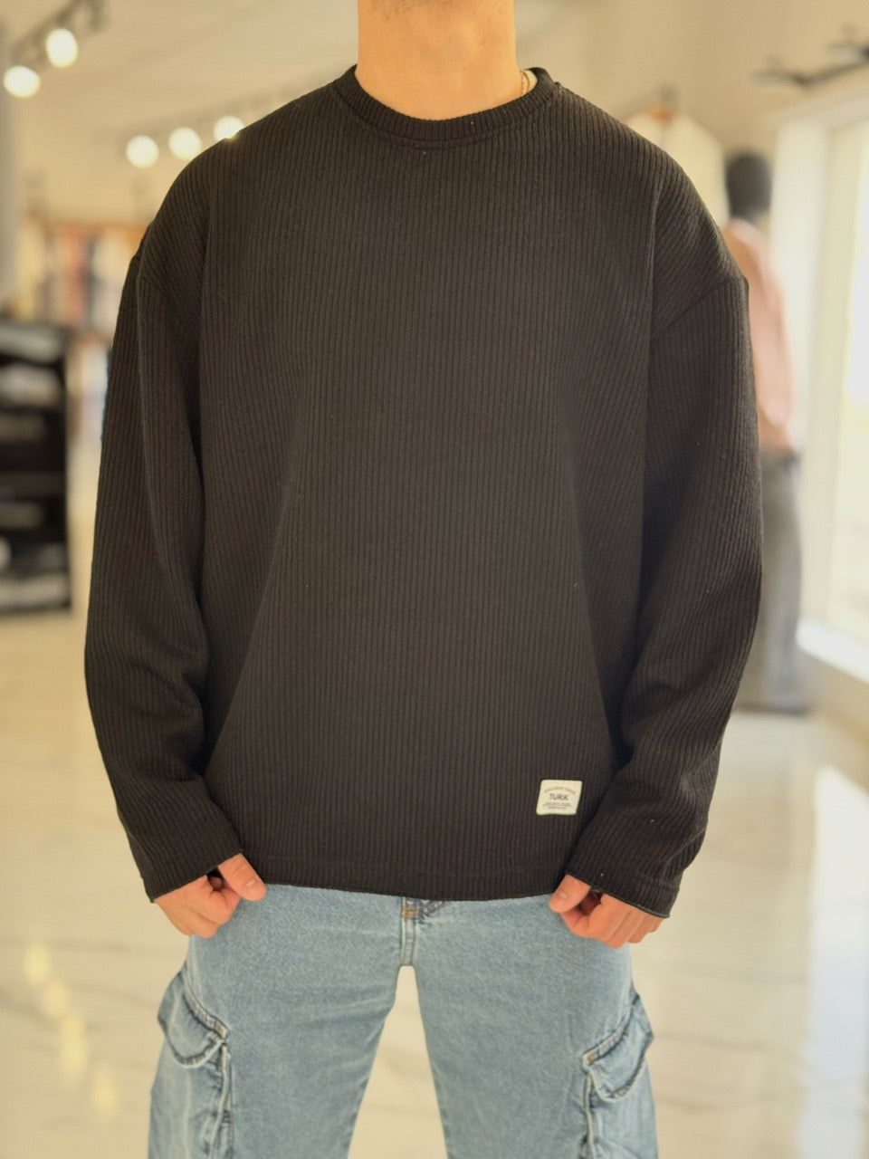 Buzo oversize tejido negro