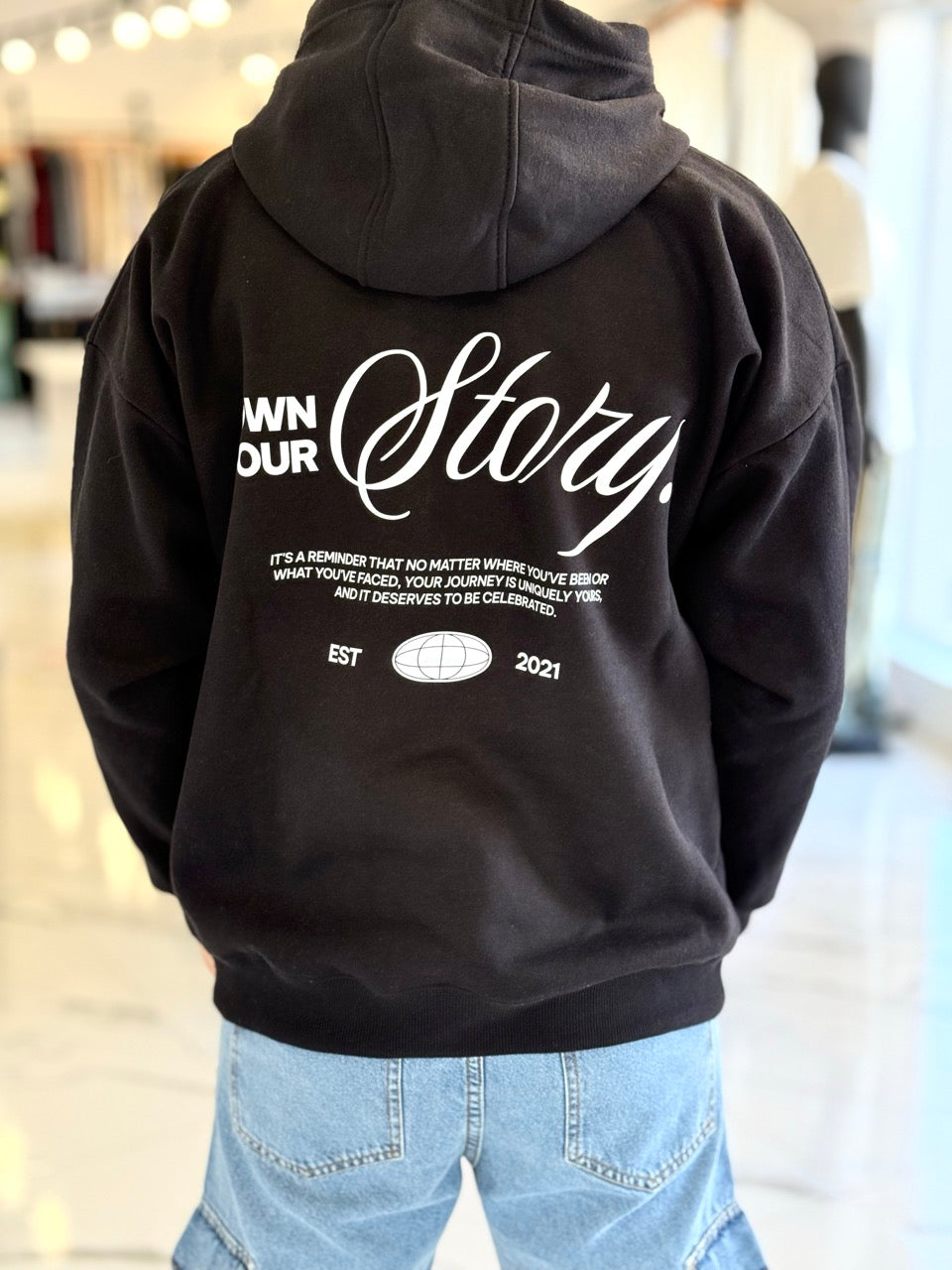 Canguro oversize negro "story"