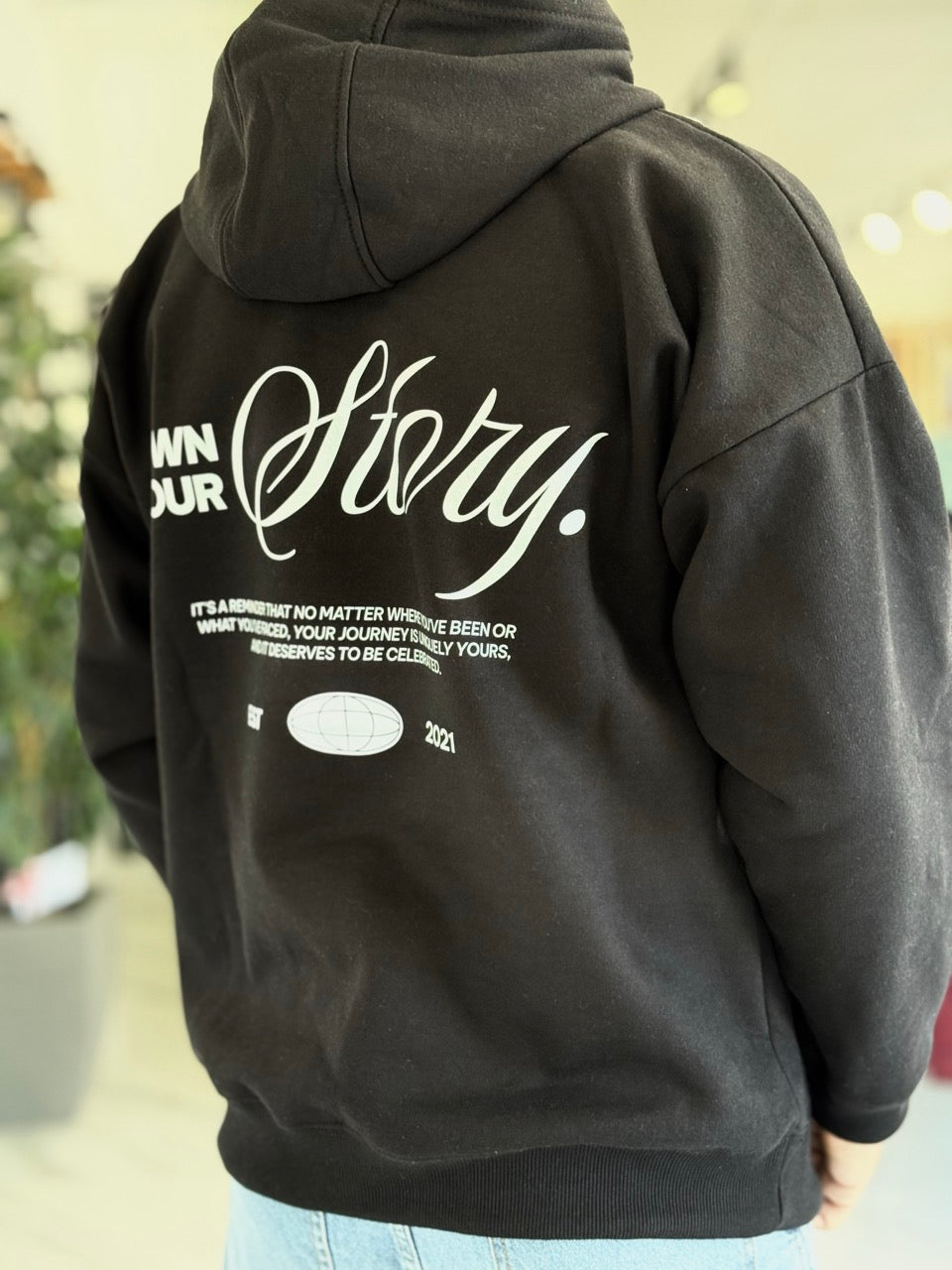 Canguro oversize negro "story"