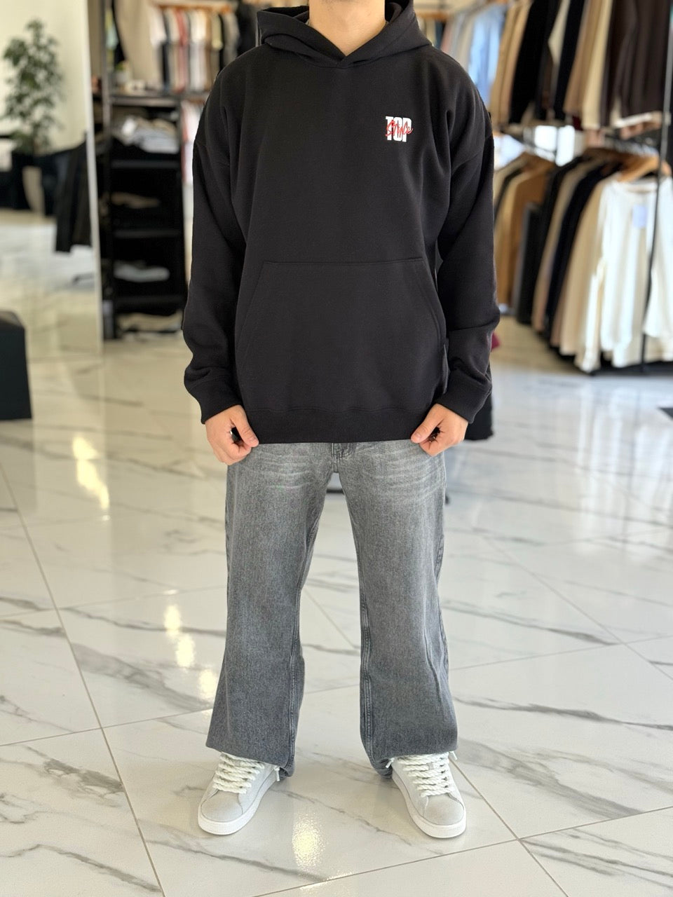 Canguro oversize negro "top style"