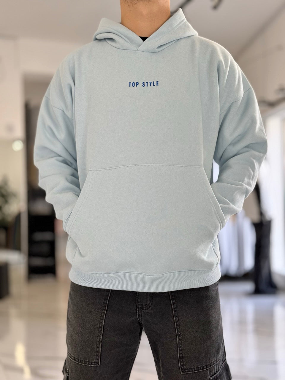 Canguro oversize celeste "escape"