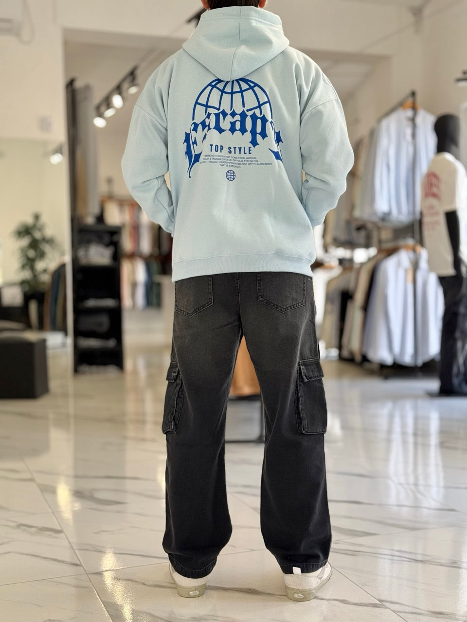 Canguro oversize celeste "escape"