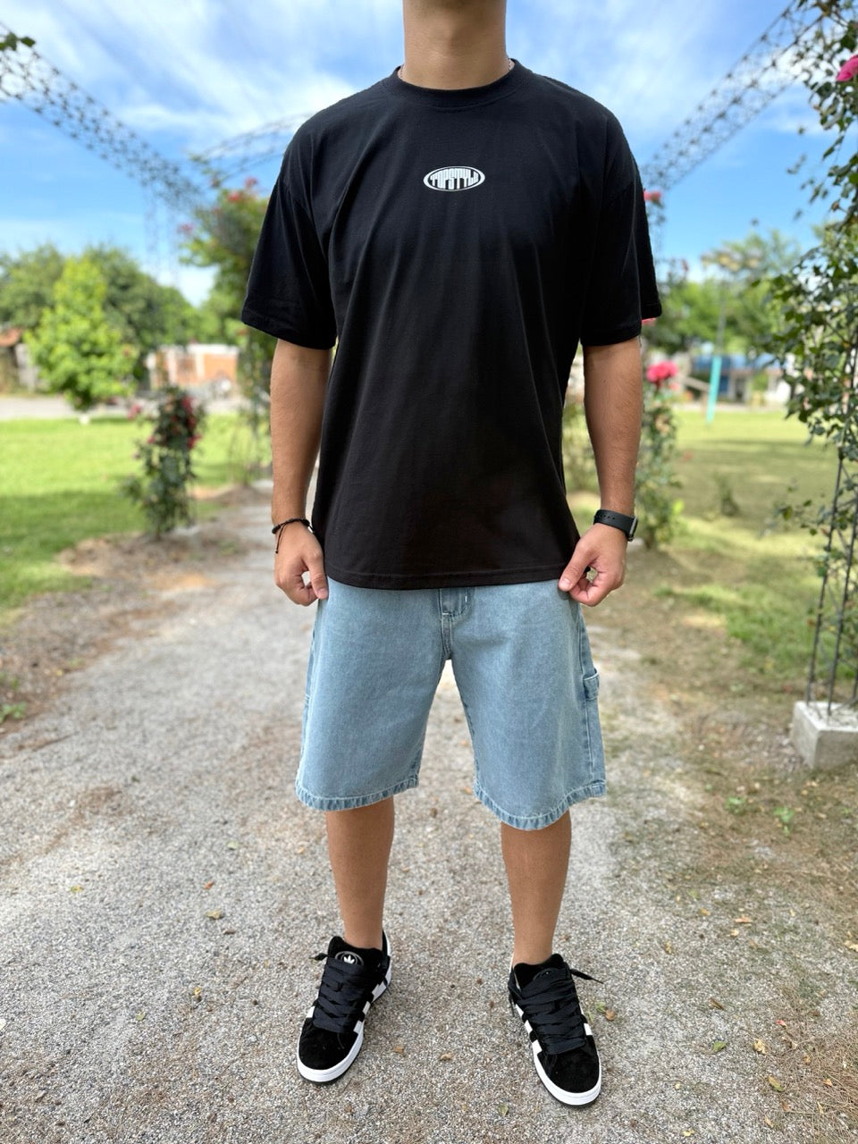 Remera oversize negra "TOP STYLE"