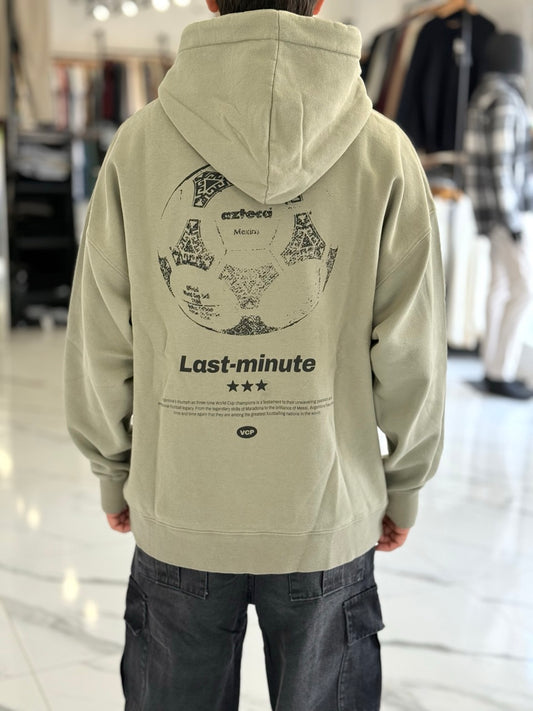 Canguro oversize verde "Minute"