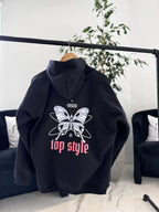 Canguro oversize negro "mariposa"