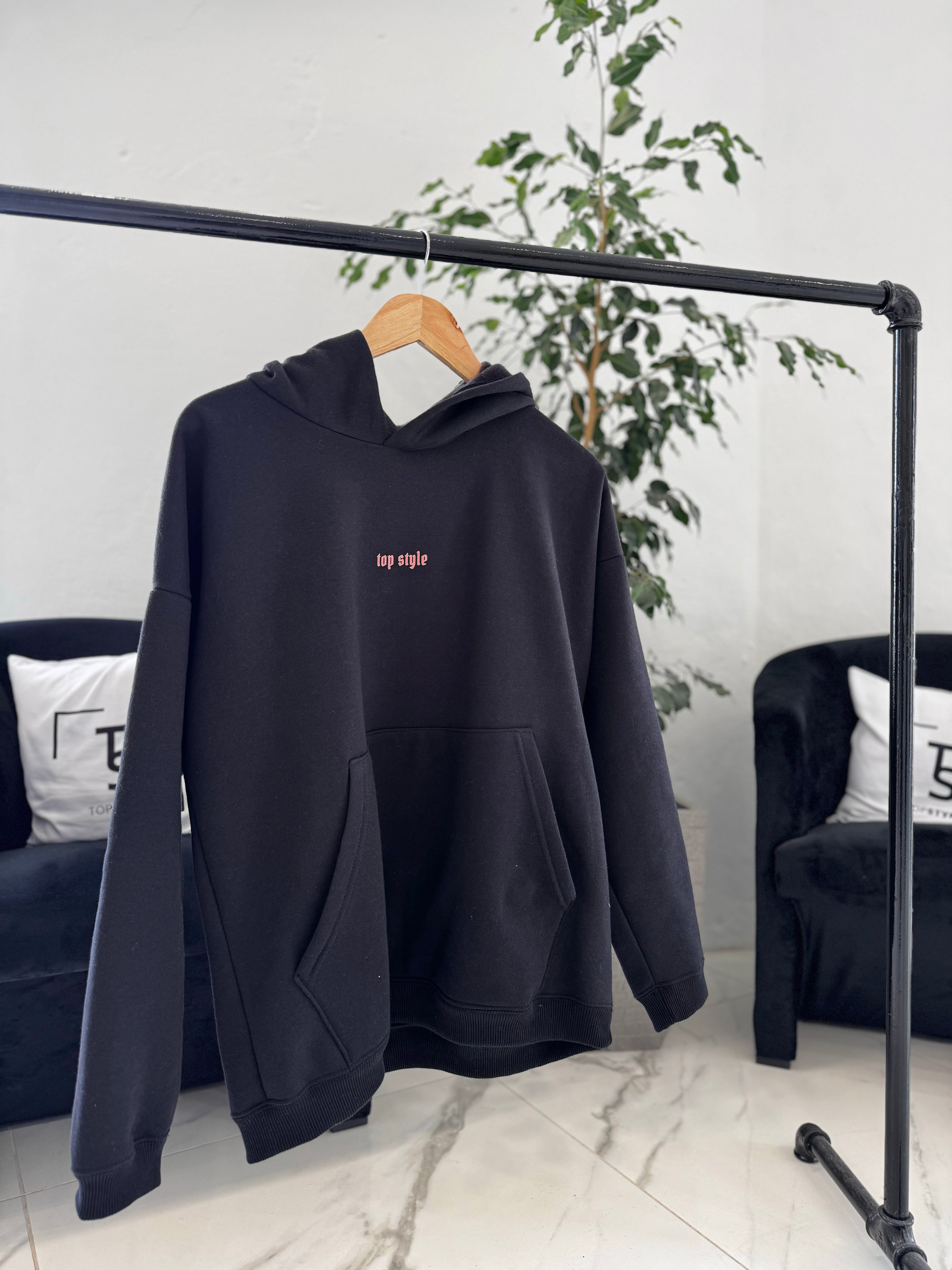 Canguro oversize negro "mariposa"