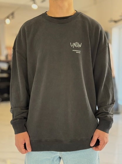 Buzo oversize "Las Grutas" negro