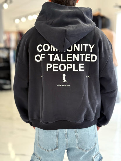 Canguro boxy fit negro "Community"