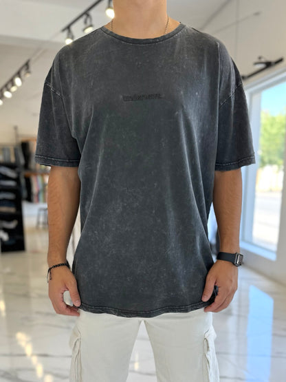 Remera oversize gastada negra “Senecio”