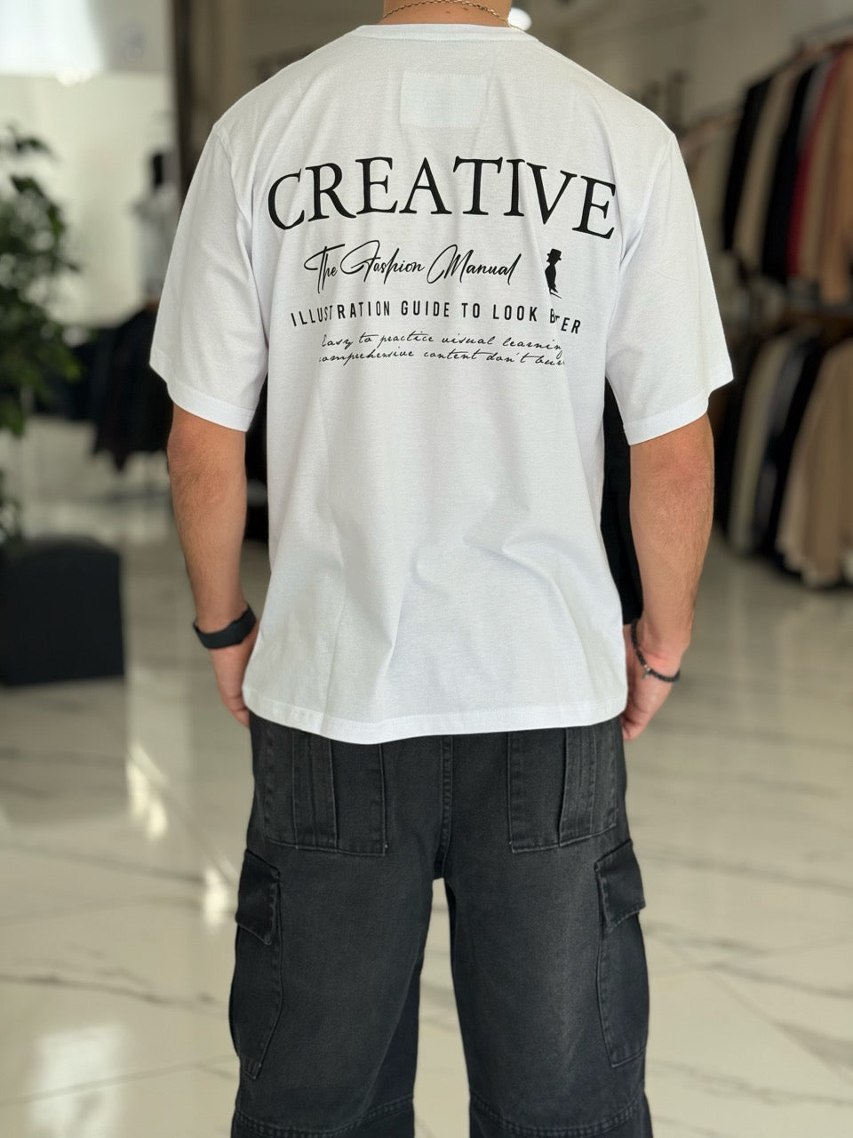 Remera oversize “Creative”