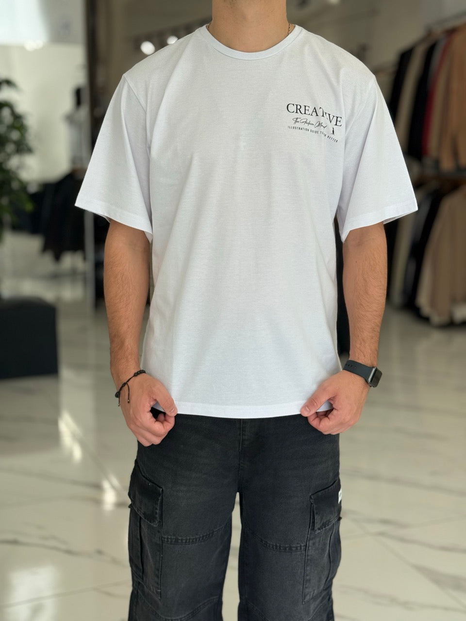 Remera oversize “Creative”