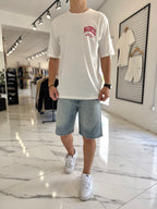 Remera oversize blanca "Madness"