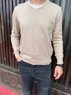 Buzo de algodón escote V beige